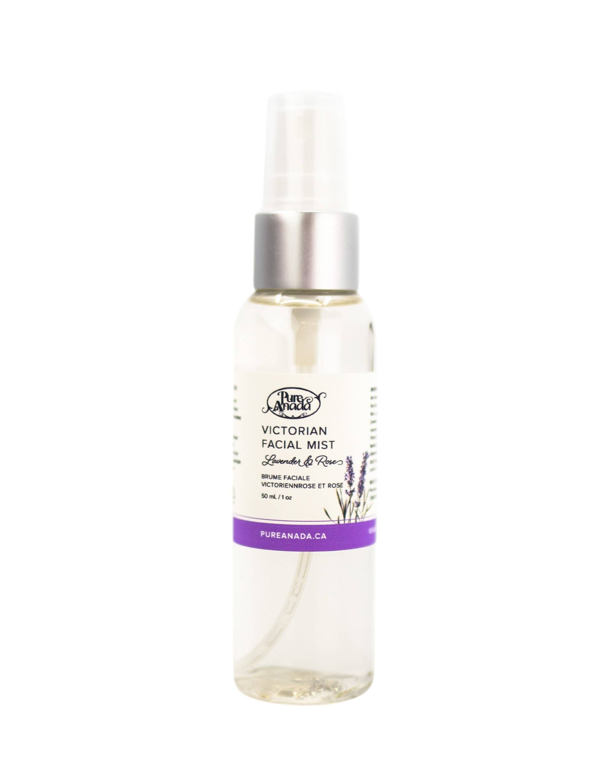 Clear spray bottle with a purple label on a white background