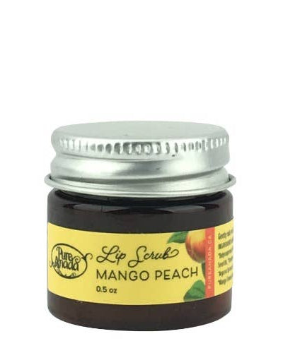 Jar of Mango Peach lip scrub with a metal lid on a white background
