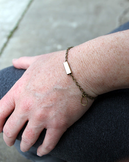 raw brass floating bar bracelet