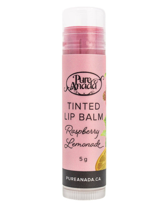 Pink tinted lip balm with 'Pure Anada' branding on a white background