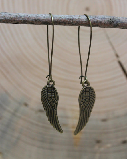 wing brass earrings