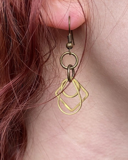 tiny free movement geometric earrings