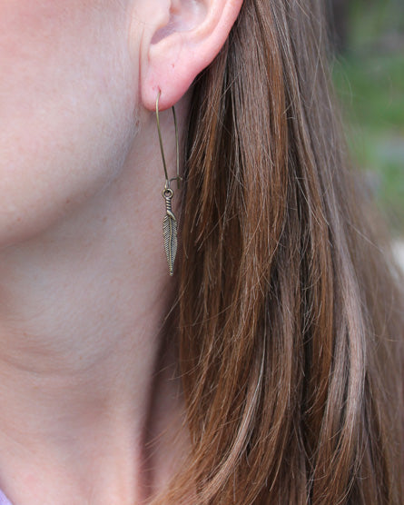 feather brass earrings
