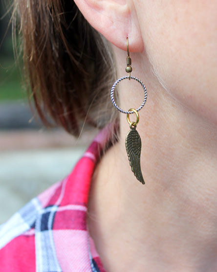 brass wing mixed metal earrings